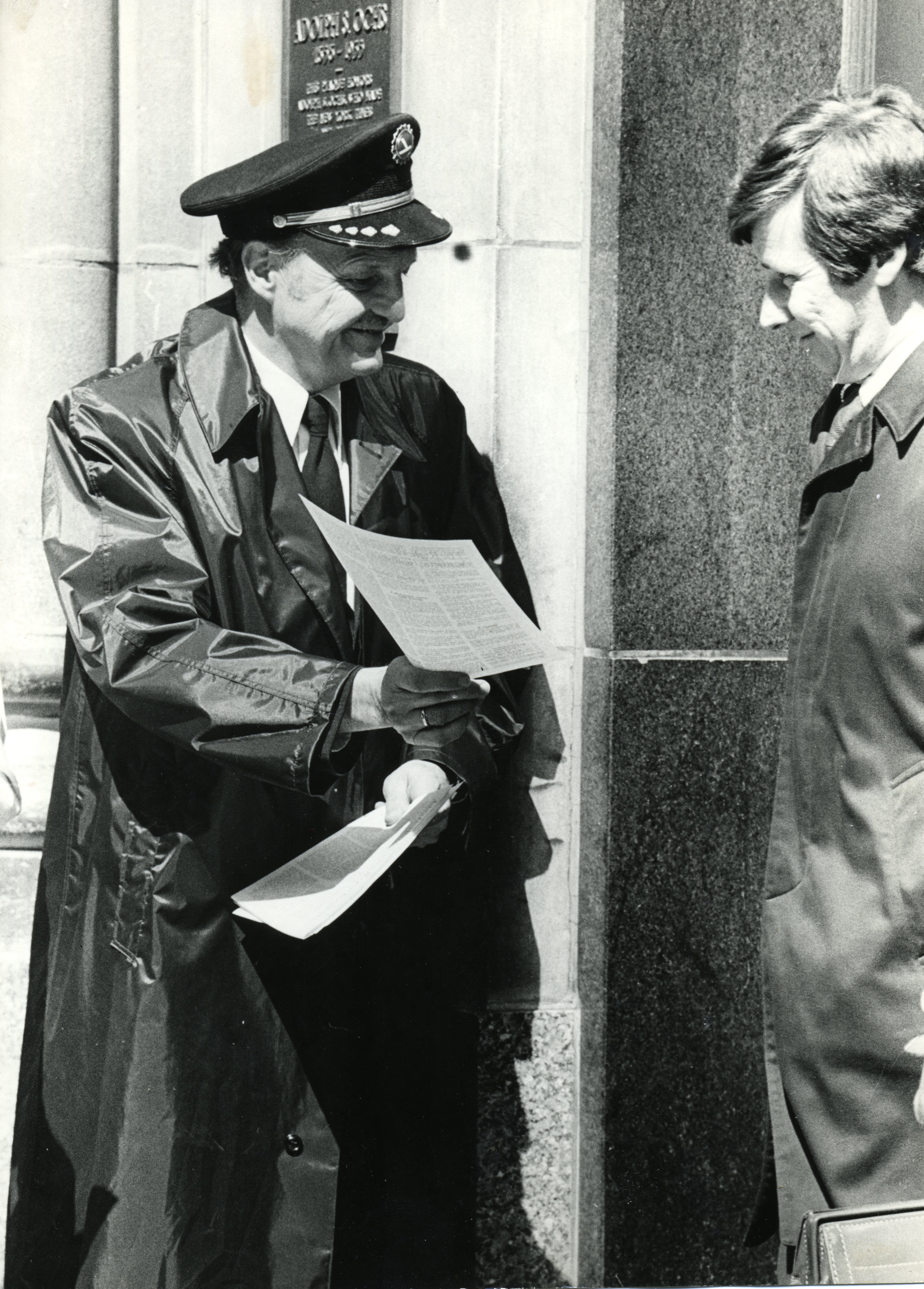 Paul Abel giving out an issue of TRO in front of the NYT